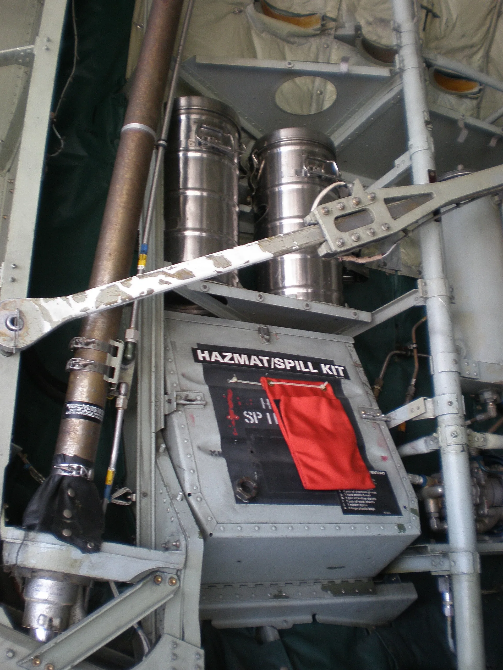 Wall-mounted HAZMAT/SPILL KIT case with red pouch